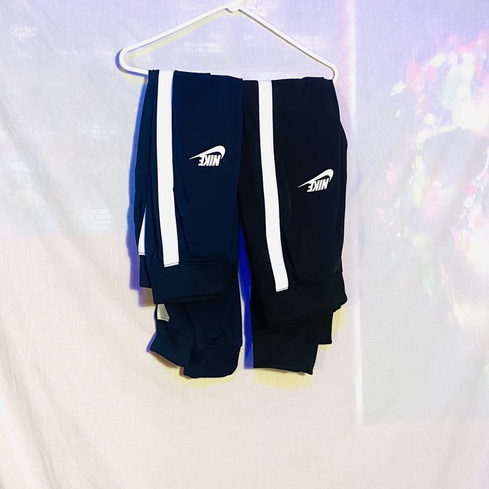 2 pair of Nike track sweat pants